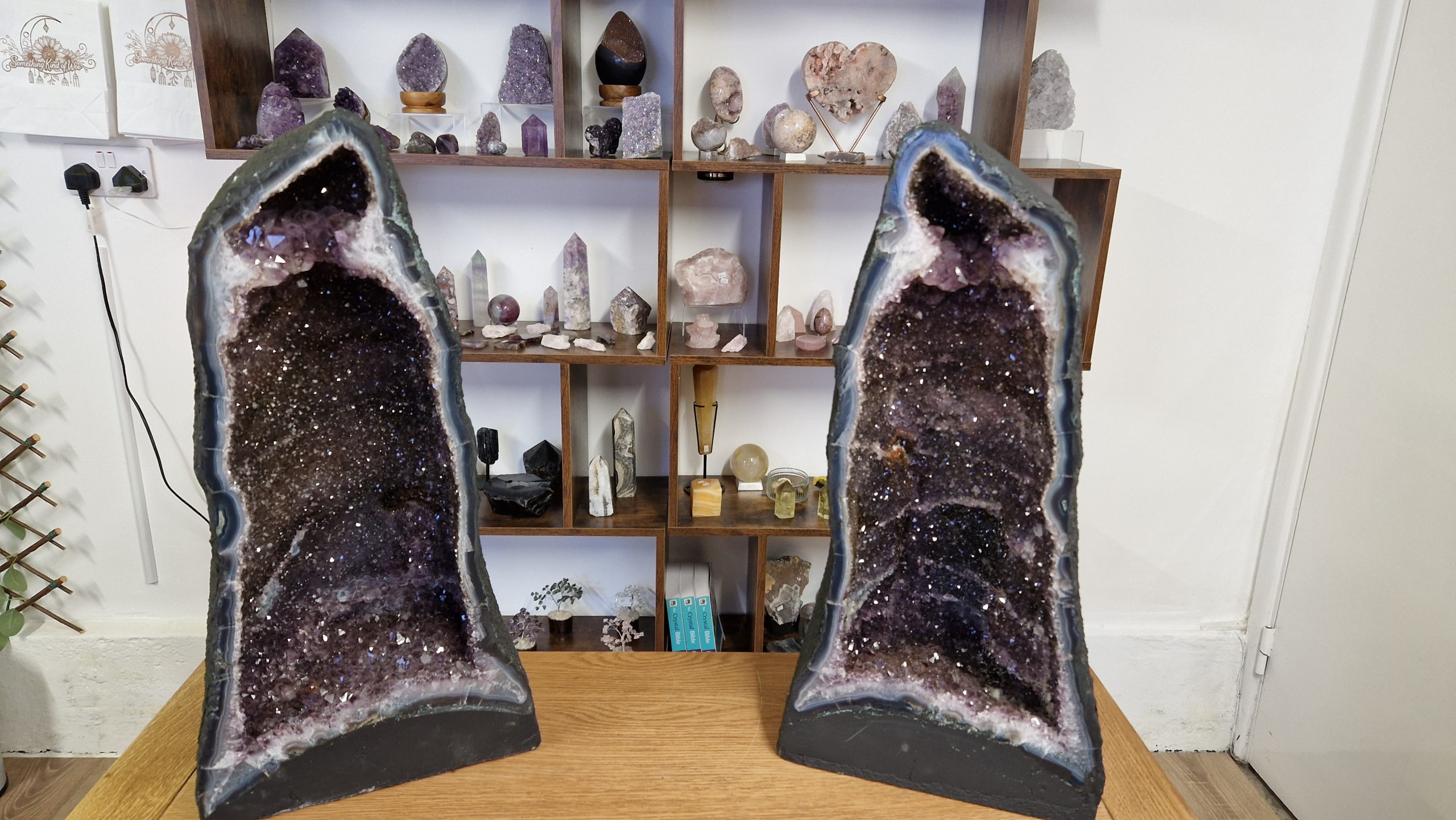 Two identical amethyst geodes
